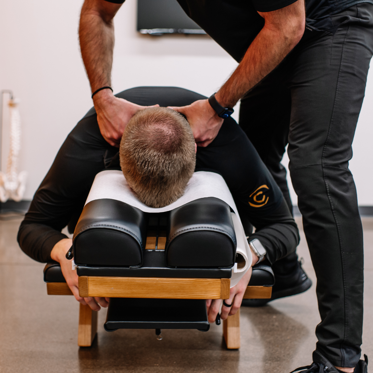 Dr. Trent Scheidecker performs a chiropractic adjustment on a client at ChiroWay, demonstrating his commitment to proactive wellness and consistent chiropractic care.